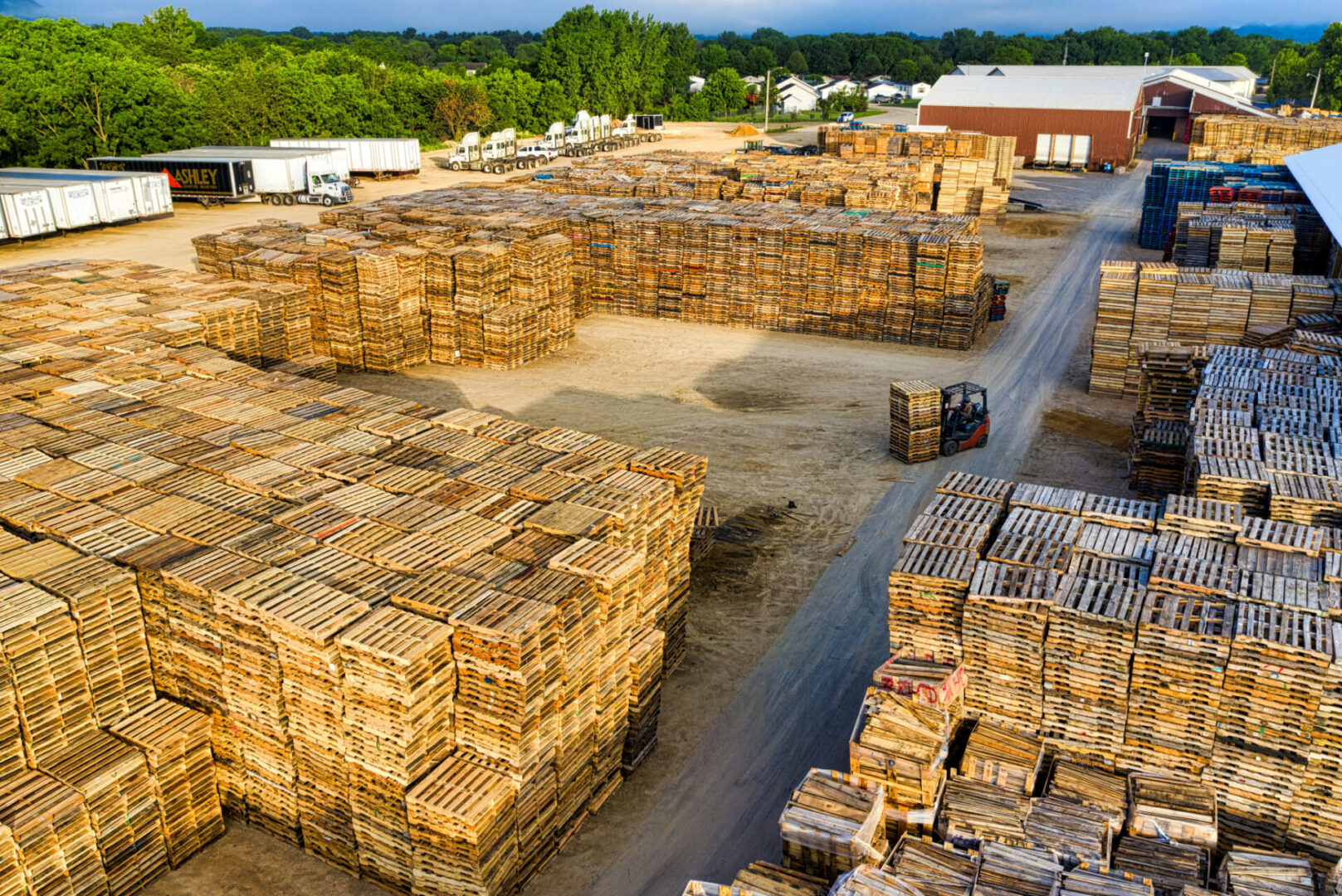 A large warehouse filled with lots of wooden crates.